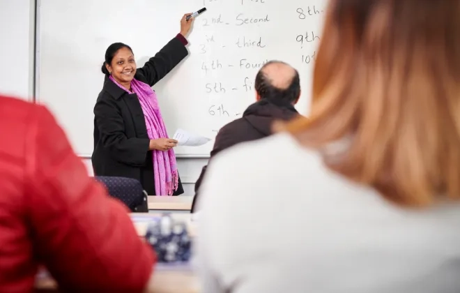 Teacher teaching in class